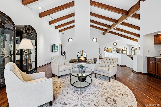 5904 Meadowbrook Dr, Morrison, CO 80465 - living room with beam ceiling, dark wood-style floors, and high vaulted ceiling