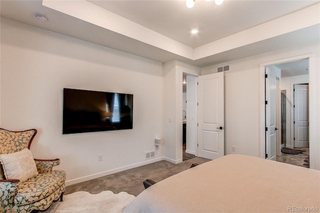 carpeted bedroom with baseboards