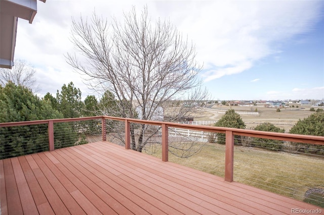 deck featuring a yard