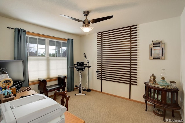 bedroom featuring carpet floors, baseboards, and a ceiling fan