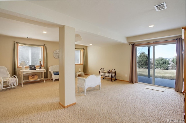 recreation room featuring recessed lighting, light colored carpet, visible vents, and baseboards