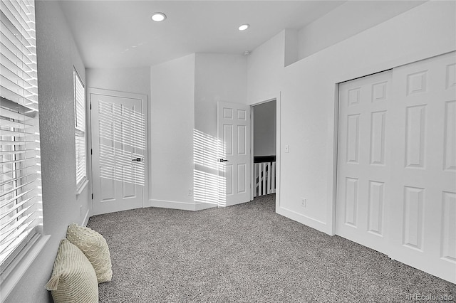 carpeted bedroom featuring a closet