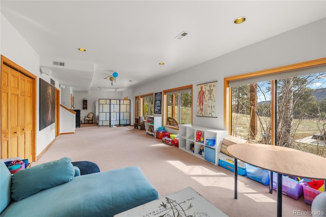 game room featuring recessed lighting, carpet, and visible vents