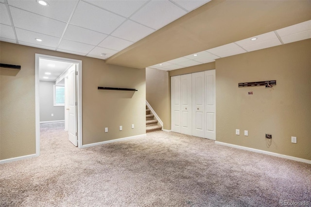 8791 Starwood Ln, Parker, CO 80134 - basement with a drop ceiling, carpet flooring, stairway, and recessed lighting