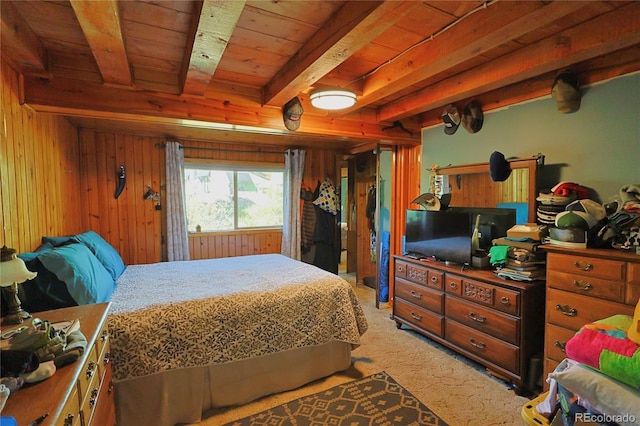 420 Quarzt Ln, Pitkin, CO 81241 - bedroom with light colored carpet, a wooden ceiling with exposed beams, and wooden walls
