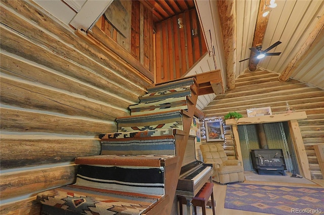 420 Quarzt Ln, Pitkin, CO 81241 - stairs with a wood stove and a ceiling fan