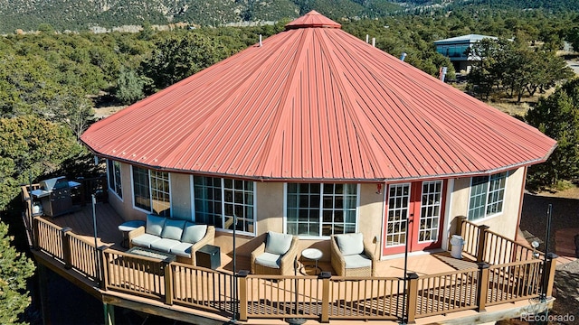 exterior space featuring outdoor lounge area and french doors