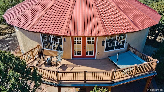 rear view of house with a deck