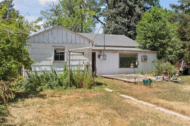 1832 S Saint Paul St, Denver, CO 80210 - single story home with a front lawn and board and batten siding