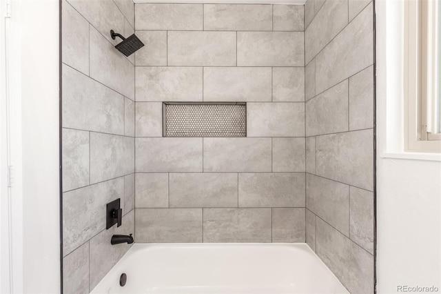 bathroom with shower / bathing tub combination