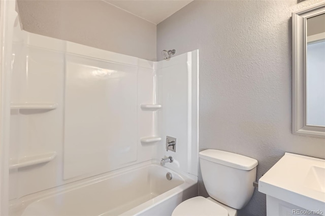 490 Washington Ave Unit A & B, Bennett, CO 80102 - bathroom with vanity, bathing tub / shower combination, and a textured wall
