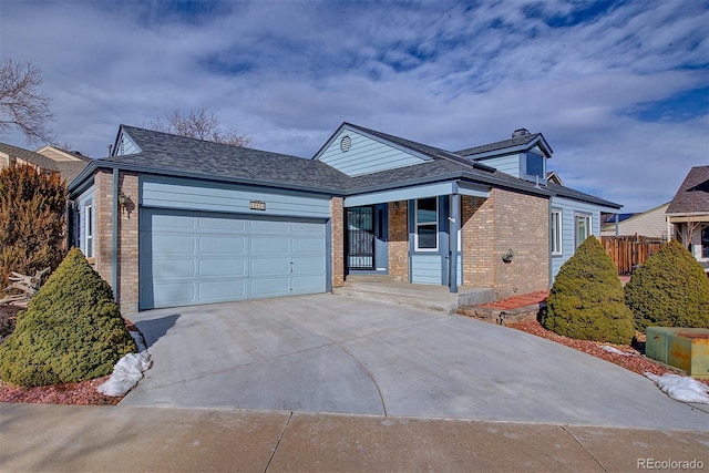 view of front of property with a garage and covered porch