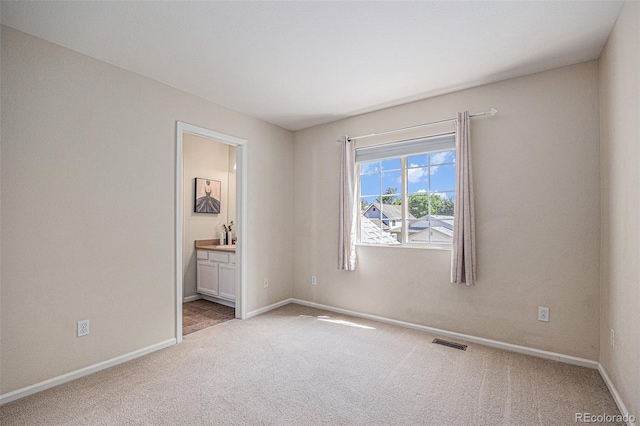 3289 Cummings Dr, Erie, CO 80516 - unfurnished bedroom featuring carpet floors and ensuite bath