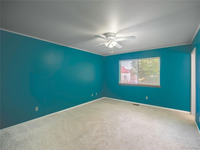 1436 H St Unit D, Salida, CO 81201 - spare room with ceiling fan, carpet, and crown molding