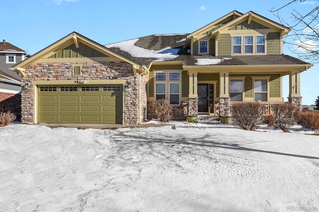 craftsman house with a porch and a garage