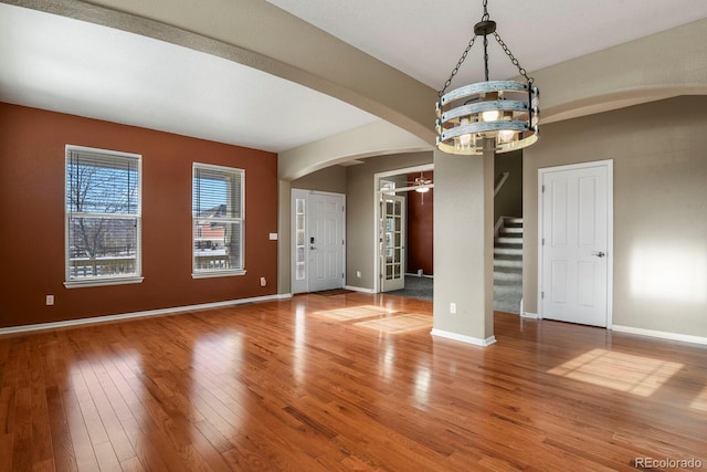 interior space featuring a chandelier and hardwood / wood-style flooring