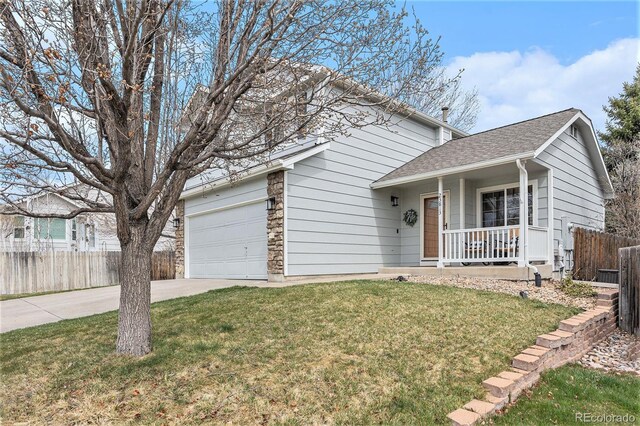 23813 Broadmoor Dr, Parker, CO 80138 - view of front of home featuring a front yard, a porch, driveway, and fence