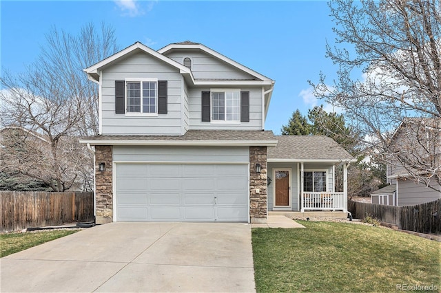 23813 Broadmoor Dr, Parker, CO 80138 - traditional-style home with concrete driveway, stone siding, a front lawn, a garage, and fence