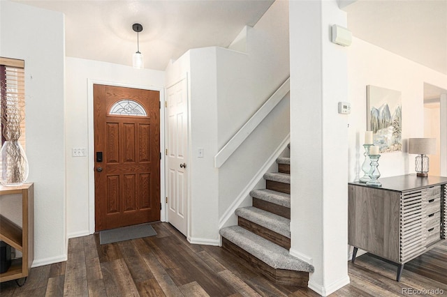23813 Broadmoor Dr, Parker, CO 80138 - entrance foyer featuring wood finished floors, baseboards, and stairway