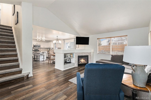 23813 Broadmoor Dr, Parker, CO 80138 - living area featuring a notable chandelier, a wealth of natural light, lofted ceiling, and stairs