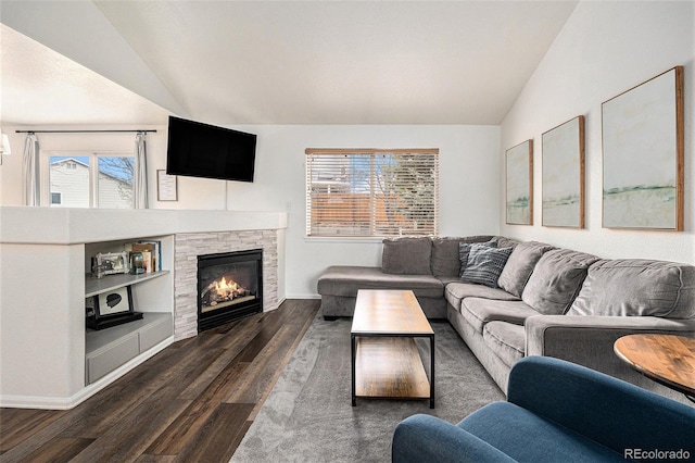 23813 Broadmoor Dr, Parker, CO 80138 - living room with dark wood-type flooring, a stone fireplace, baseboards, and lofted ceiling