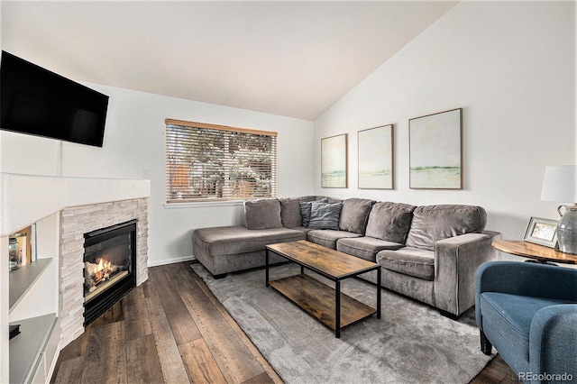 23813 Broadmoor Dr, Parker, CO 80138 - living area with a stone fireplace, hardwood / wood-style flooring, and lofted ceiling