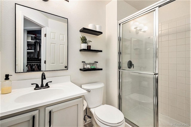 23813 Broadmoor Dr, Parker, CO 80138 - bathroom with toilet, a shower stall, and vanity