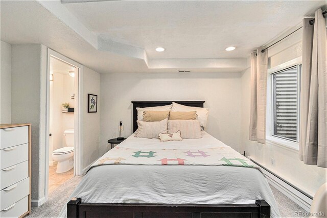 23813 Broadmoor Dr, Parker, CO 80138 - bedroom featuring visible vents, a baseboard radiator, recessed lighting, connected bathroom, and light carpet