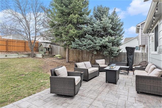 23813 Broadmoor Dr, Parker, CO 80138 - view of patio / terrace with an outdoor living space with a fire pit, a fenced backyard, and a vegetable garden