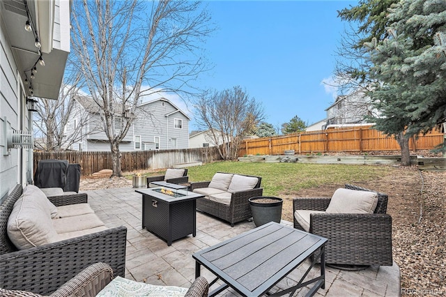 23813 Broadmoor Dr, Parker, CO 80138 - view of patio with an outdoor living space with a fire pit and a fenced backyard