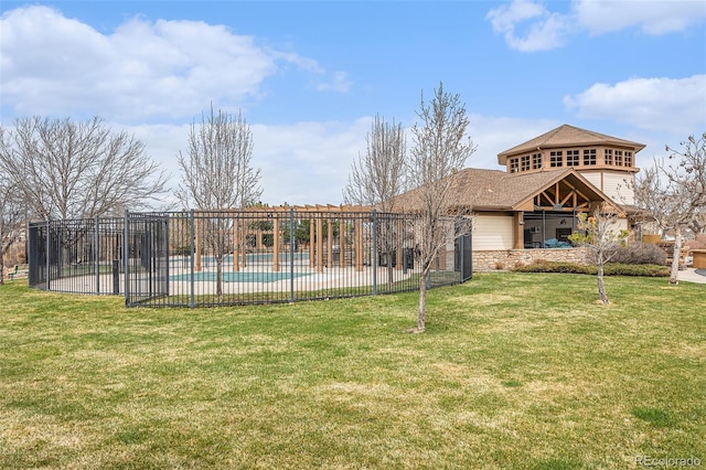 23813 Broadmoor Dr, Parker, CO 80138 - back of property with a yard, fence, stone siding, and a fenced in pool