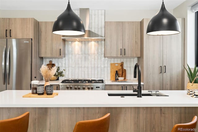 kitchen with light countertops, a sink, and modern cabinets