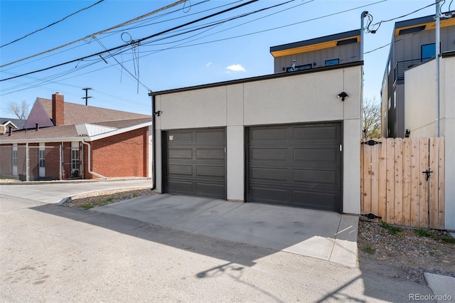 garage featuring fence