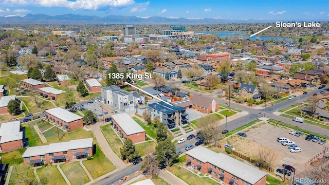 bird's eye view featuring a water and mountain view
