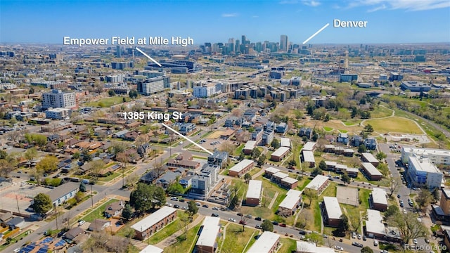 birds eye view of property featuring a city view