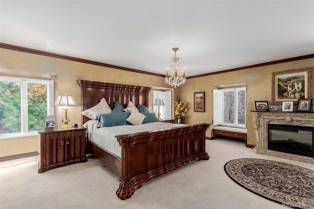 carpeted bedroom featuring a premium fireplace, crown molding, and a notable chandelier