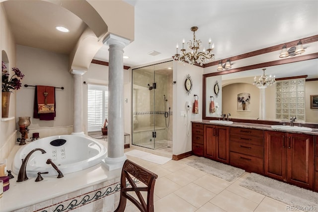 bathroom featuring vanity, tile patterned flooring, shower with separate bathtub, a notable chandelier, and decorative columns