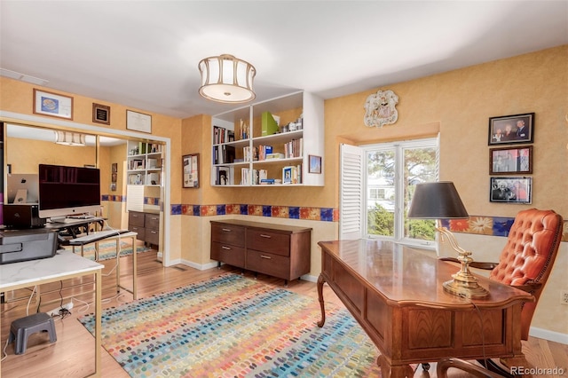 office space featuring light hardwood / wood-style floors