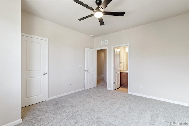 16062 W 62nd Ln, Arvada, CO 80403 - unfurnished bedroom with light carpet, ensuite bath, and ceiling fan