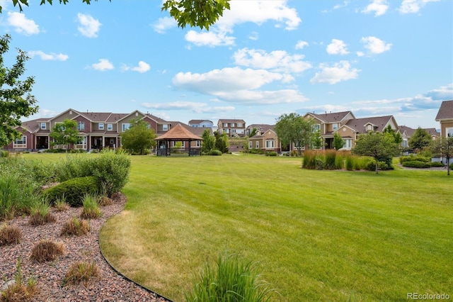 16062 W 62nd Ln, Arvada, CO 80403 - view of green lawn with a residential view and a gazebo