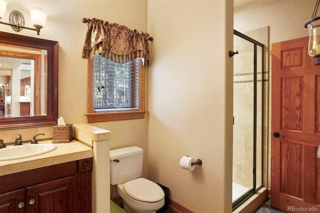 20050 Lost Arrowhead Dr, Monument, CO 80132 - bathroom featuring a shower stall, toilet, and vanity