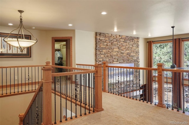 20050 Lost Arrowhead Dr, Monument, CO 80132 - corridor with an upstairs landing, carpet, and recessed lighting