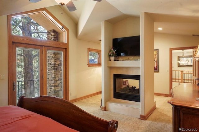 20050 Lost Arrowhead Dr, Monument, CO 80132 - bedroom featuring carpet floors, lofted ceiling, a fireplace, and baseboards