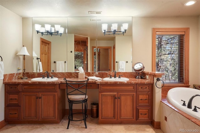 20050 Lost Arrowhead Dr, Monument, CO 80132 - bathroom with a chandelier, plenty of natural light, and a bath