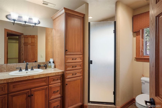 20050 Lost Arrowhead Dr, Monument, CO 80132 - bathroom with a shower stall, toilet, and vanity