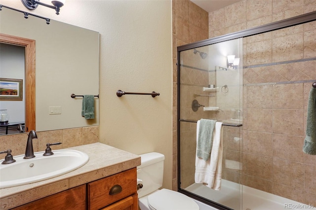 20050 Lost Arrowhead Dr, Monument, CO 80132 - full bathroom with tiled shower, toilet, and vanity
