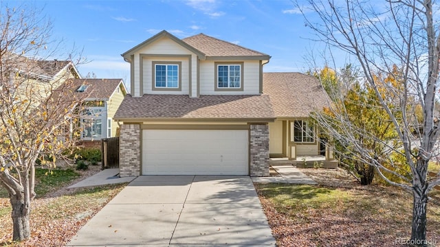 view of front of property with a garage