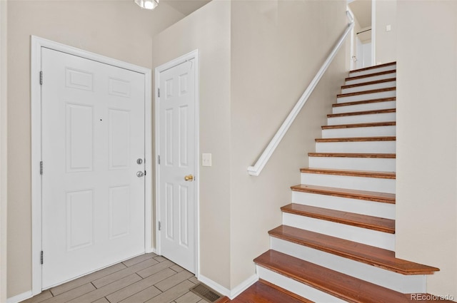 foyer with hardwood / wood-style flooring