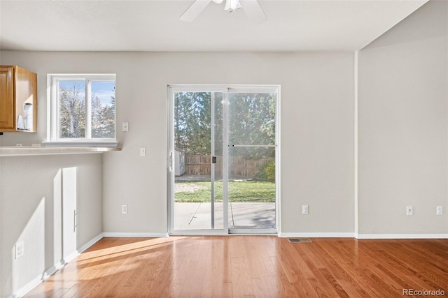 interior space featuring ceiling fan and light wood-type flooring