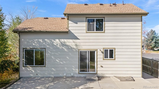 back of house with a patio